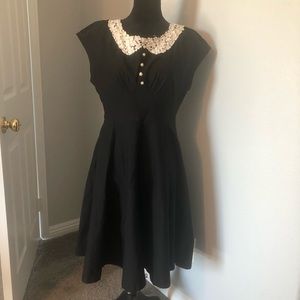 Black dress with white lace collar